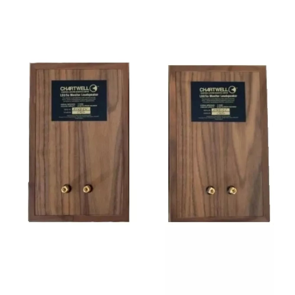 Two Walnut back view LS3/5  Chartwell on a white background