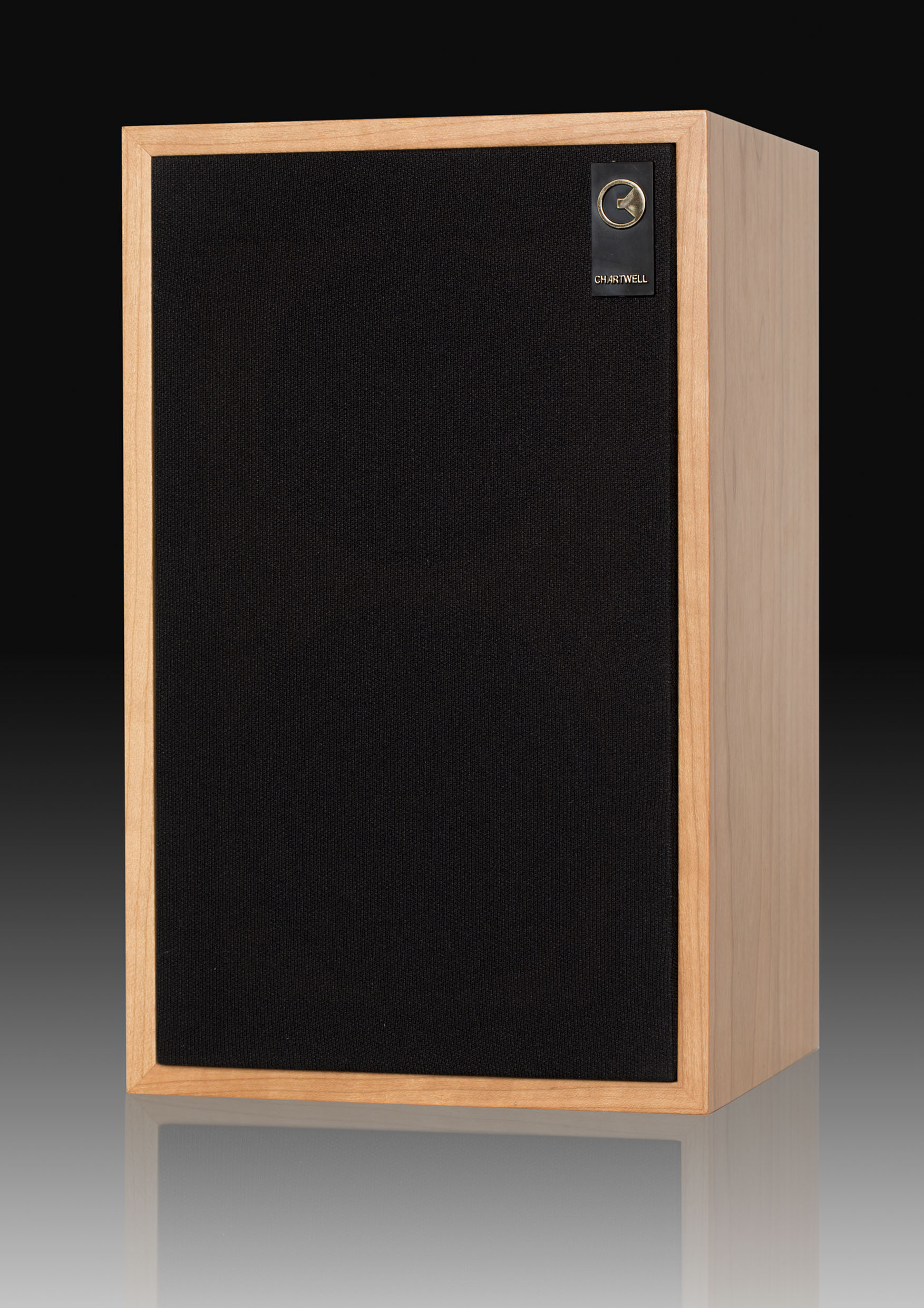 Chartwell BBC LS3/5 wooden speakers with grille on a white background