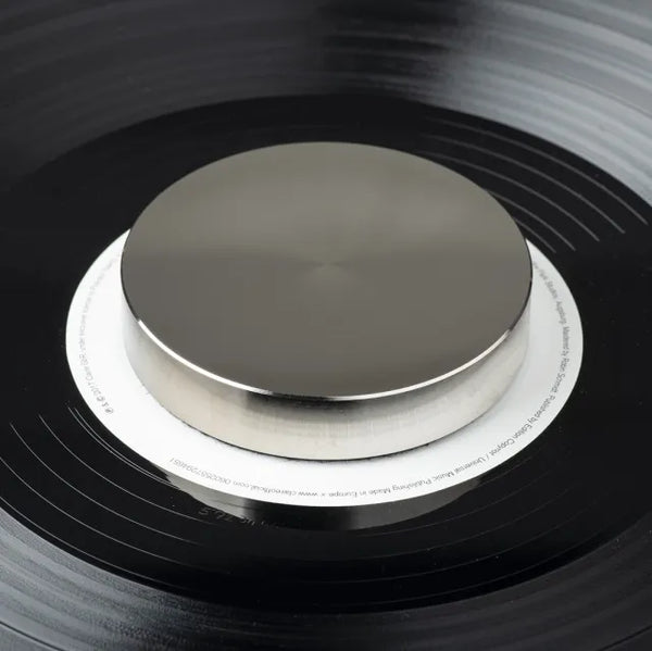 Record Puck PRO - Stabilize your records   Reduces unwanted resonances & improves playback of warped records. The label is protected by the felt pad on the underside.